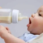 The child is drinking formula